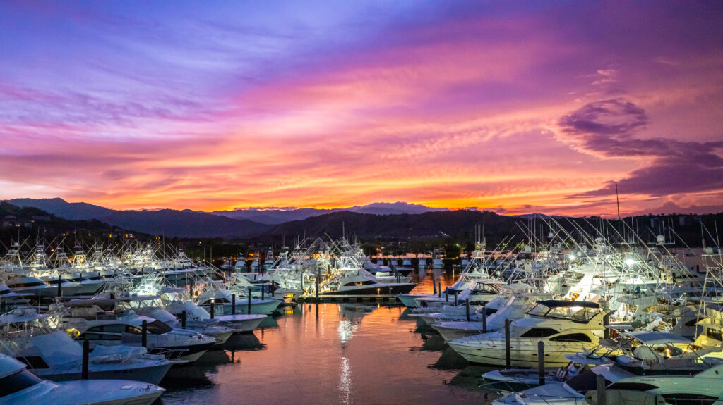 Sportfishing yachts at Los Sueños Resort and Marina in Costa Rica at sunrise.